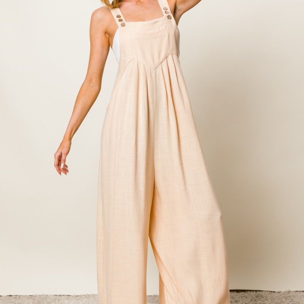 
                      
                        Textured Sleeveless Wide Leg Jumpsuit
                      
                    