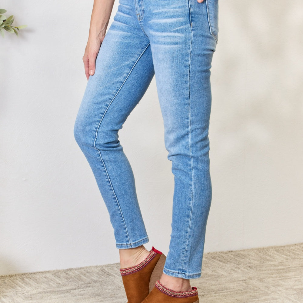 
                      
                        RISEN Mid Rise Skinny Jeans
                      
                    