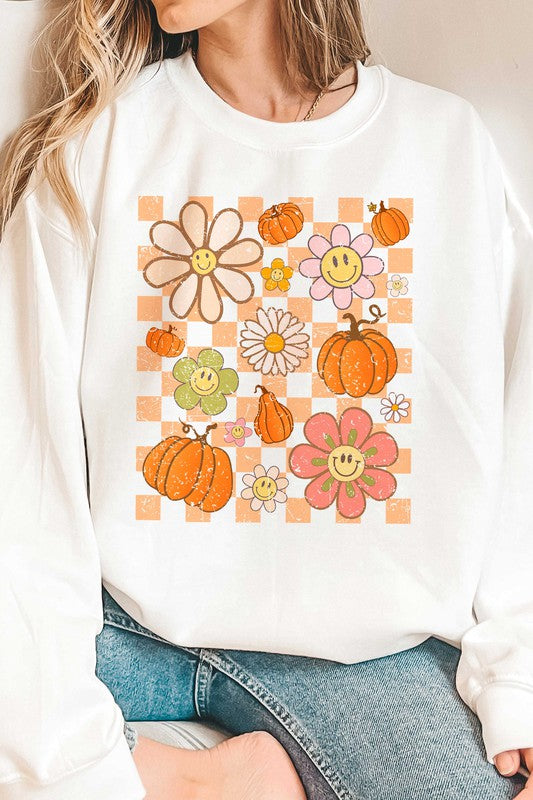 CHECKERED PUMPKINS AND DAISIES GRAPHIC SWEATSHIRT