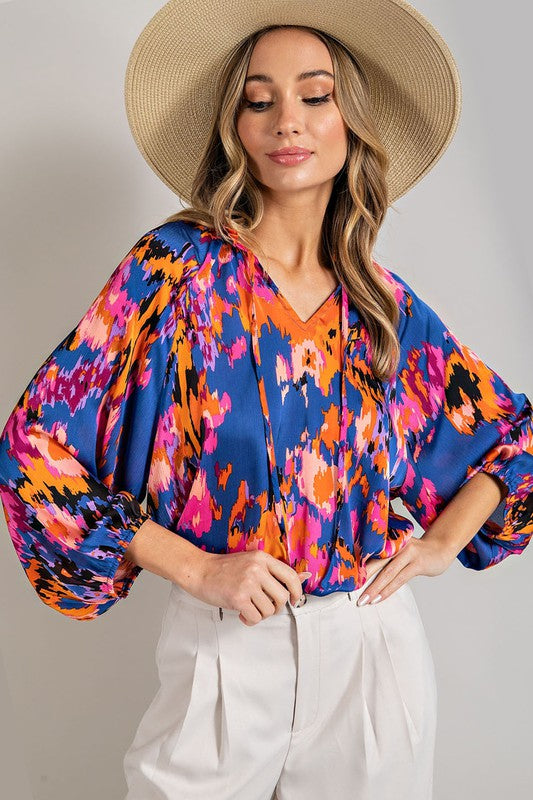 
                      
                        Carmen V-Neck Printed Top
                      
                    