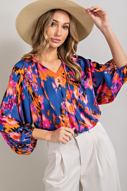 
                      
                        Carmen V-Neck Printed Top
                      
                    