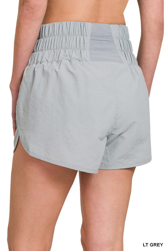 
                      
                        Khloe Smocked Waistband Running Shorts
                      
                    