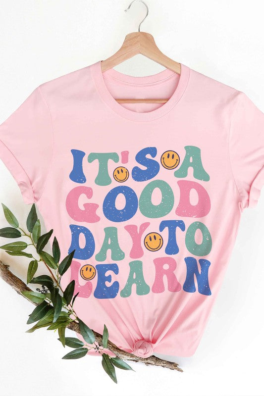 
                      
                        IT'S A GOOD DAY TO LEARN HAPPY FACE GRAPHIC TEE
                      
                    