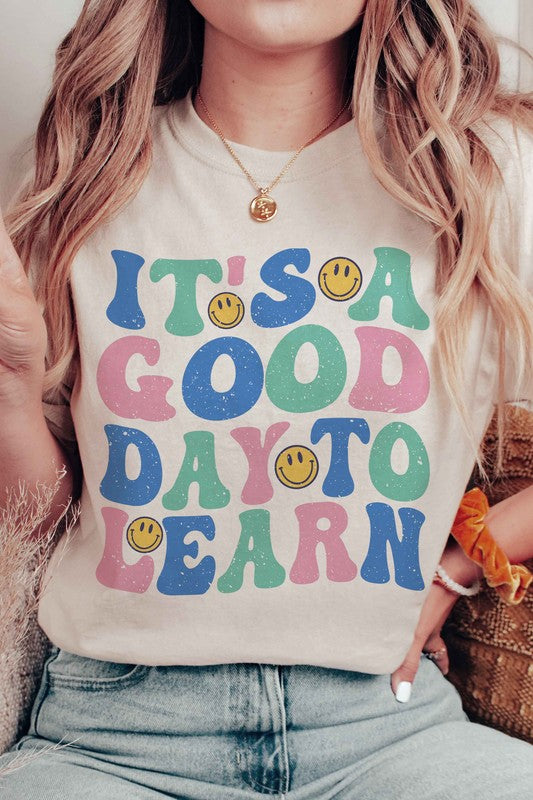 
                      
                        IT'S A GOOD DAY TO LEARN HAPPY FACE GRAPHIC TEE
                      
                    