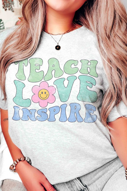 
                      
                        TEACH LOVE INSPIRE DAISY HAPPY FACE GRAPHIC TEE
                      
                    