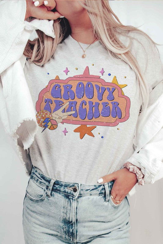 
                      
                        GROOVY TEACHER GRAPHIC TEE
                      
                    