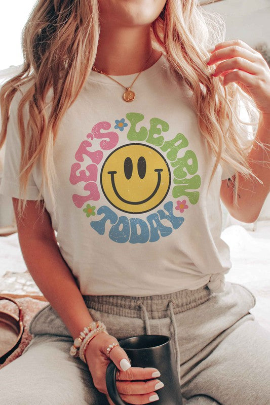 
                      
                        LET'S LEARN TODAY HAPPY FACE Graphic Tee
                      
                    