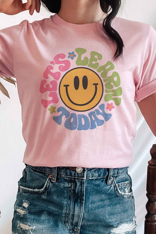 
                      
                        LET'S LEARN TODAY HAPPY FACE Graphic Tee
                      
                    