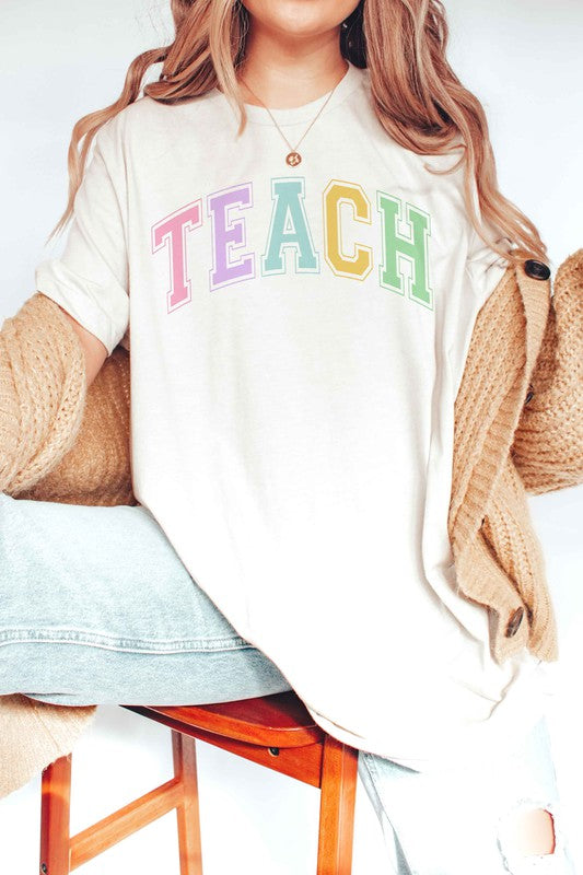 
                      
                        TEACH GRAPHIC TEE
                      
                    