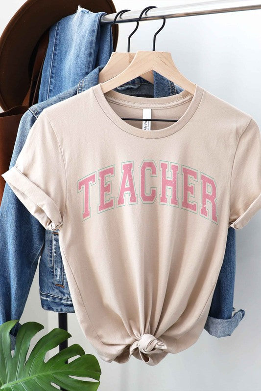 
                      
                        TEACHER GRAPHIC TEE
                      
                    