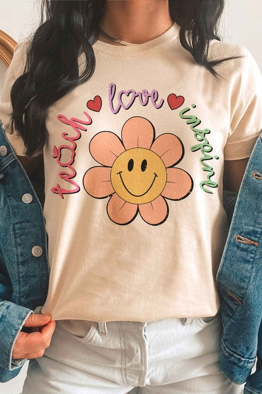 
                      
                        TEACH LOVE INSPIRE DAISY HAPPY FACE GRAPHIC TEE
                      
                    