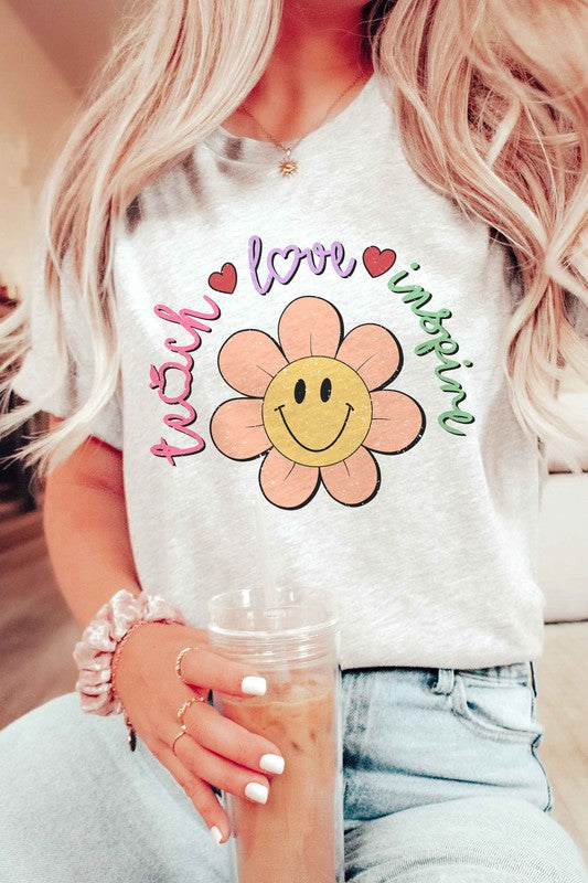 TEACH LOVE INSPIRE DAISY HAPPY FACE GRAPHIC TEE