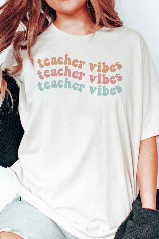 
                      
                        TEACHER VIBES Graphic Tee
                      
                    