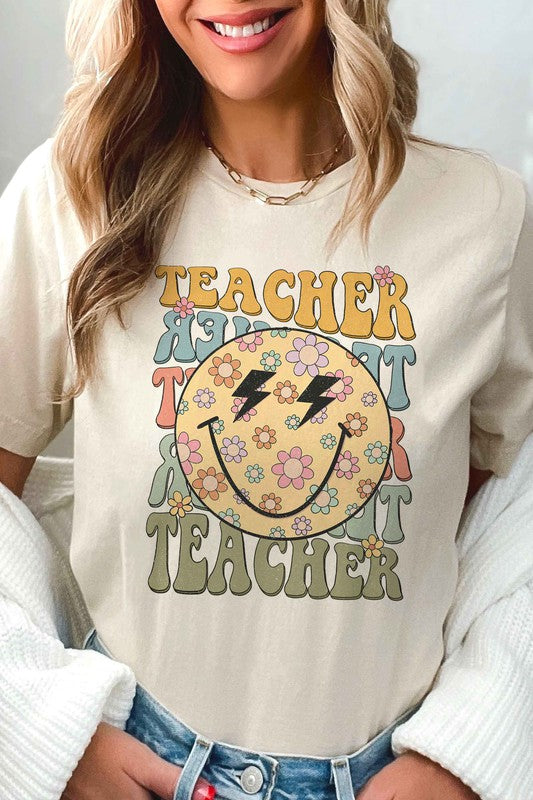 
                      
                        RETRO HAPPY FACE TEACHER REPEAT GRAPHIC TEE
                      
                    