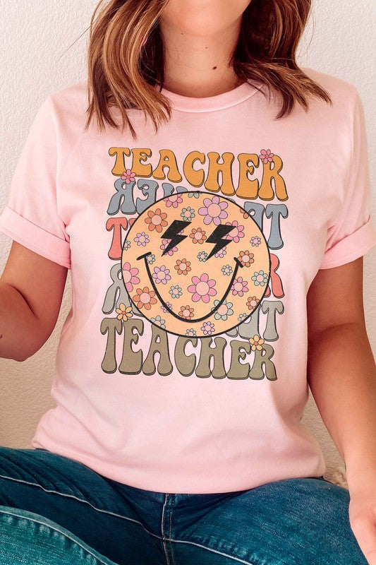 
                      
                        RETRO HAPPY FACE TEACHER REPEAT GRAPHIC TEE
                      
                    