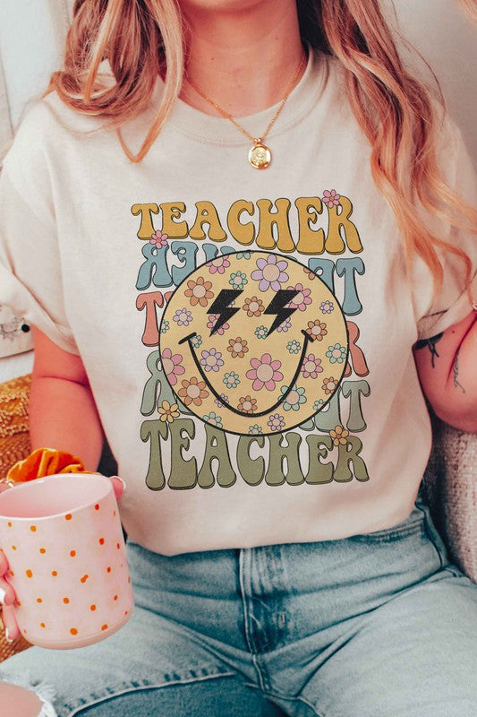 
                      
                        RETRO HAPPY FACE TEACHER REPEAT GRAPHIC TEE
                      
                    