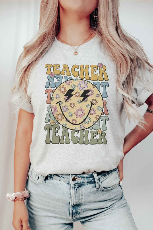 
                      
                        RETRO HAPPY FACE TEACHER REPEAT GRAPHIC TEE
                      
                    