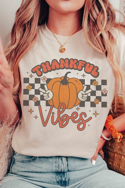 
                      
                        CHECKER THANKFUL VIBES PUMPKIN GRAPHIC TEE
                      
                    