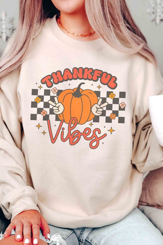 
                      
                        THANKFUL VIBES PUMPKIN GRAPHIC SWEATSHIRT
                      
                    