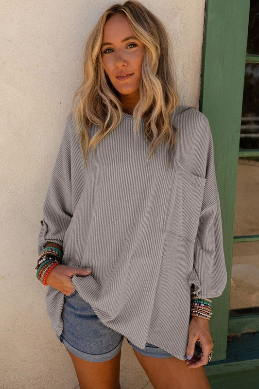 
                      
                        Ribbed tab sleeve oversize pocket top
                      
                    