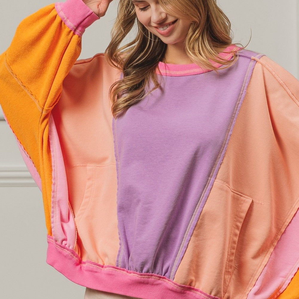 
                      
                        Color Block Exposed Seam Sweatshirt with Pockets
                      
                    