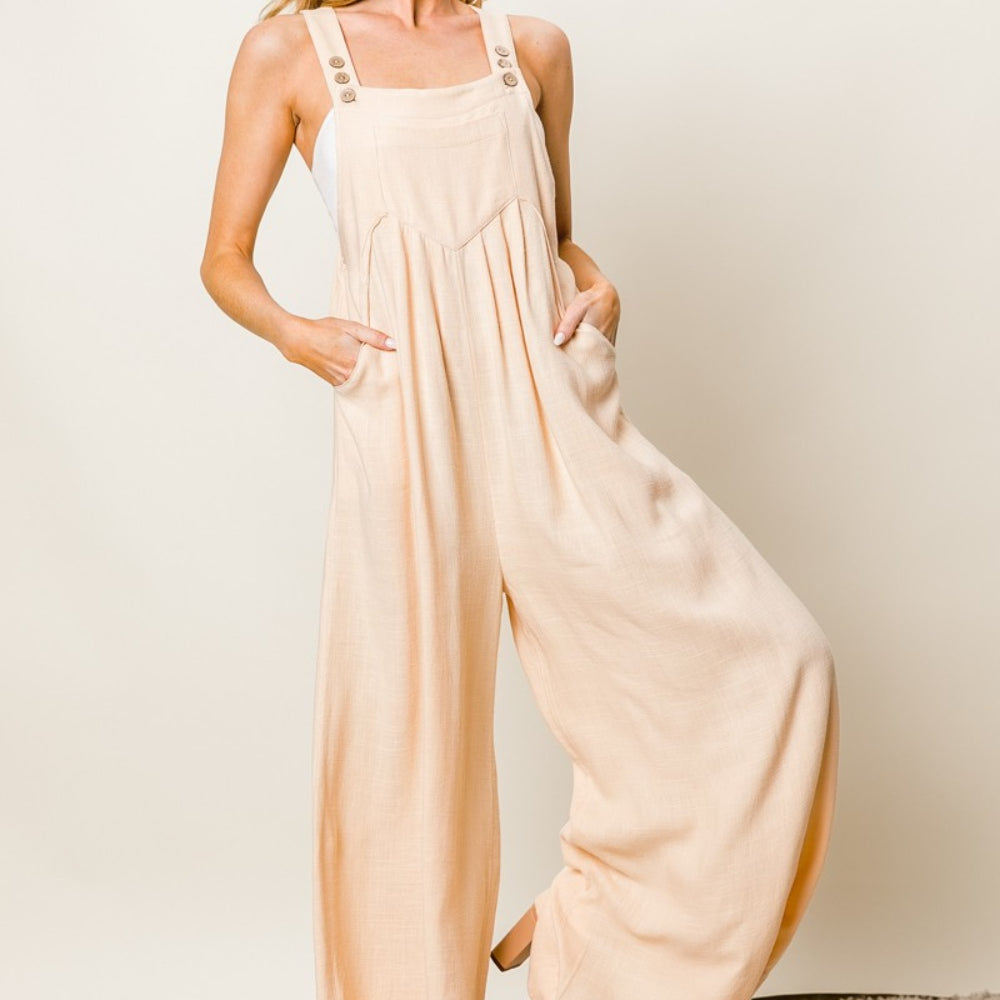 
                      
                        Textured Sleeveless Wide Leg Jumpsuit
                      
                    