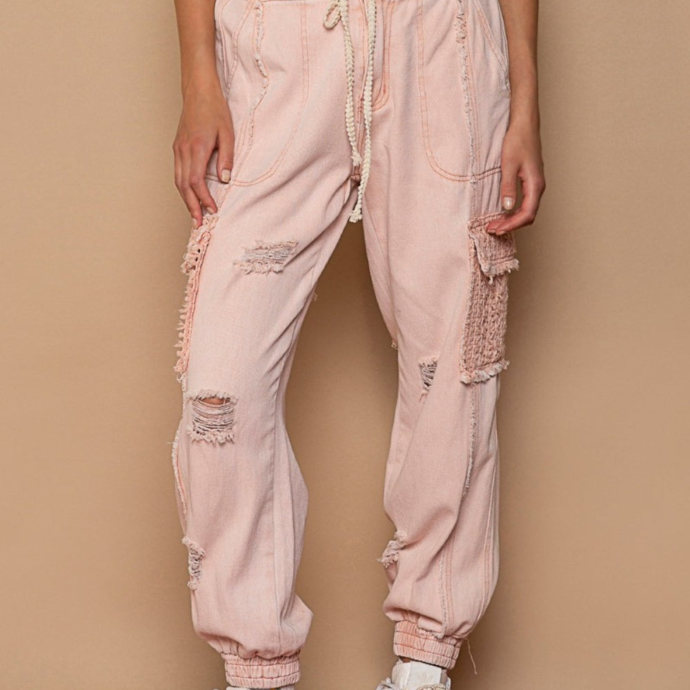 
                      
                        Distressed Cargo Denim Jogger with Crochet Pockets
                      
                    