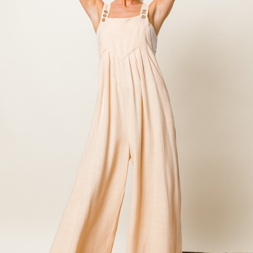 
                      
                        Textured Sleeveless Wide Leg Jumpsuit
                      
                    