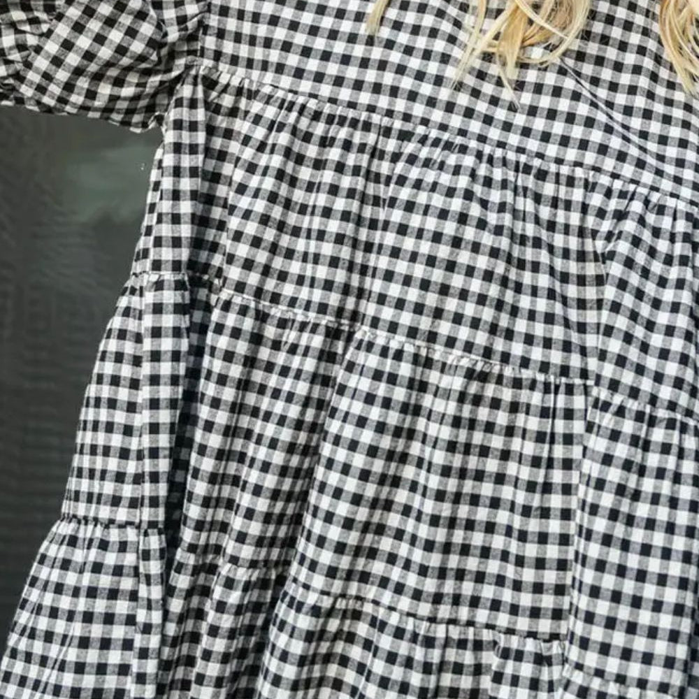 
                      
                        Tiered Plaid Round Neck Long Sleeve Blouse
                      
                    