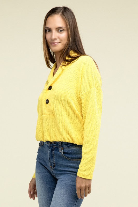 
                      
                        Textured Line Elastic Waist Pullover Top
                      
                    