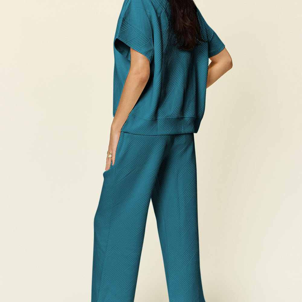 
                      
                        Texture Half Zip Short Sleeve Top and Pants Set
                      
                    