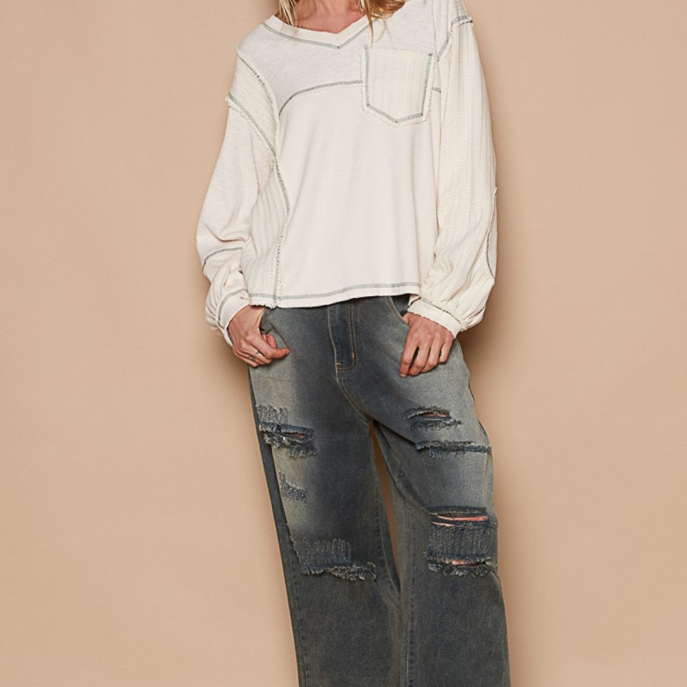 
                      
                        V-Neck knit Panel Exposed Seam Top
                      
                    