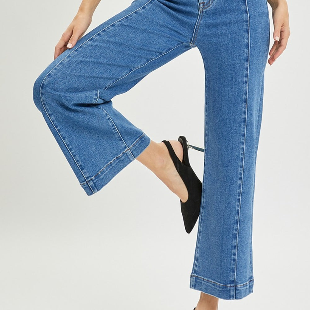 
                      
                        Risen High Rise Wide Leg Jeans
                      
                    