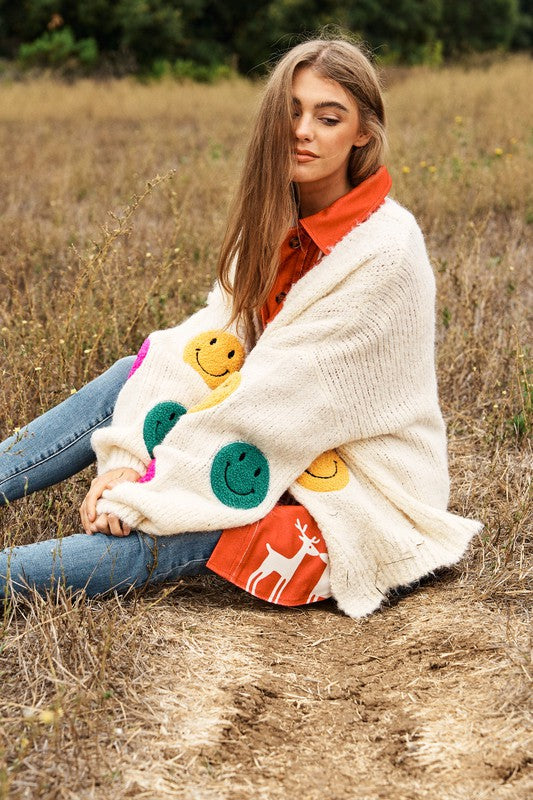 
                      
                        The Fuzzy Smile Long Bell Sleeve Knit Cardigan
                      
                    