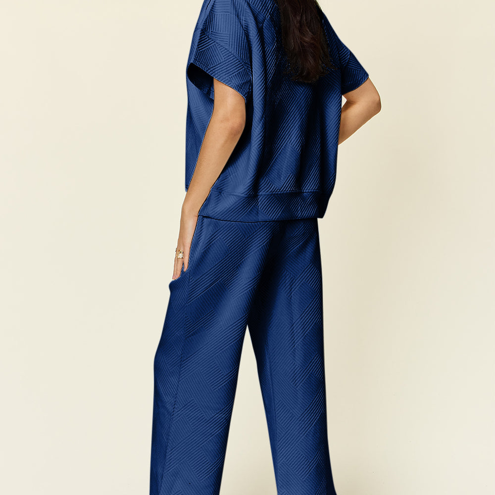 
                      
                        Texture Half Zip Short Sleeve Top and Pants Set
                      
                    