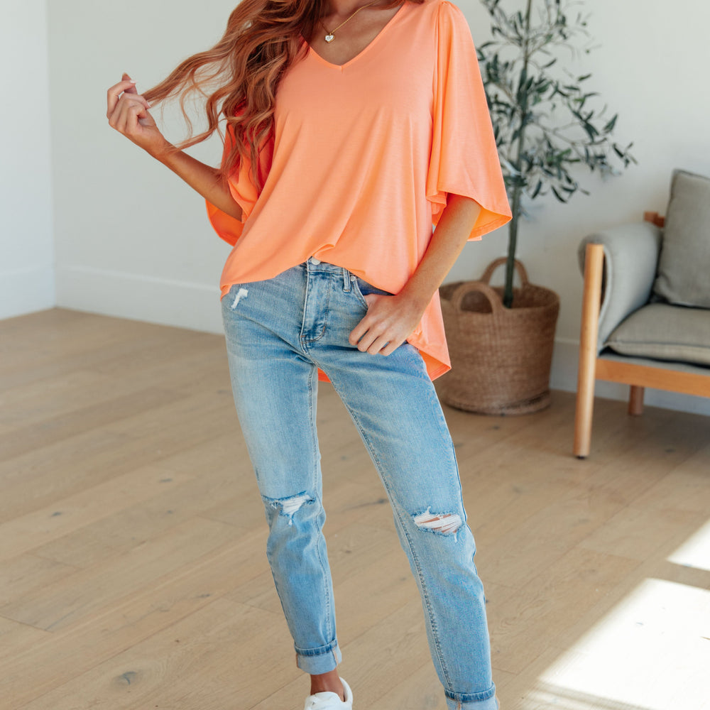 
                      
                        Cali Blouse in Neon Orange
                      
                    