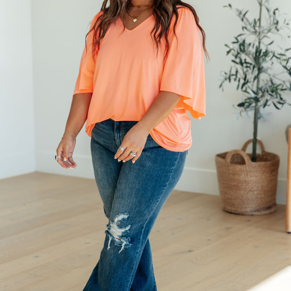 
                      
                        Cali Blouse in Neon Orange
                      
                    