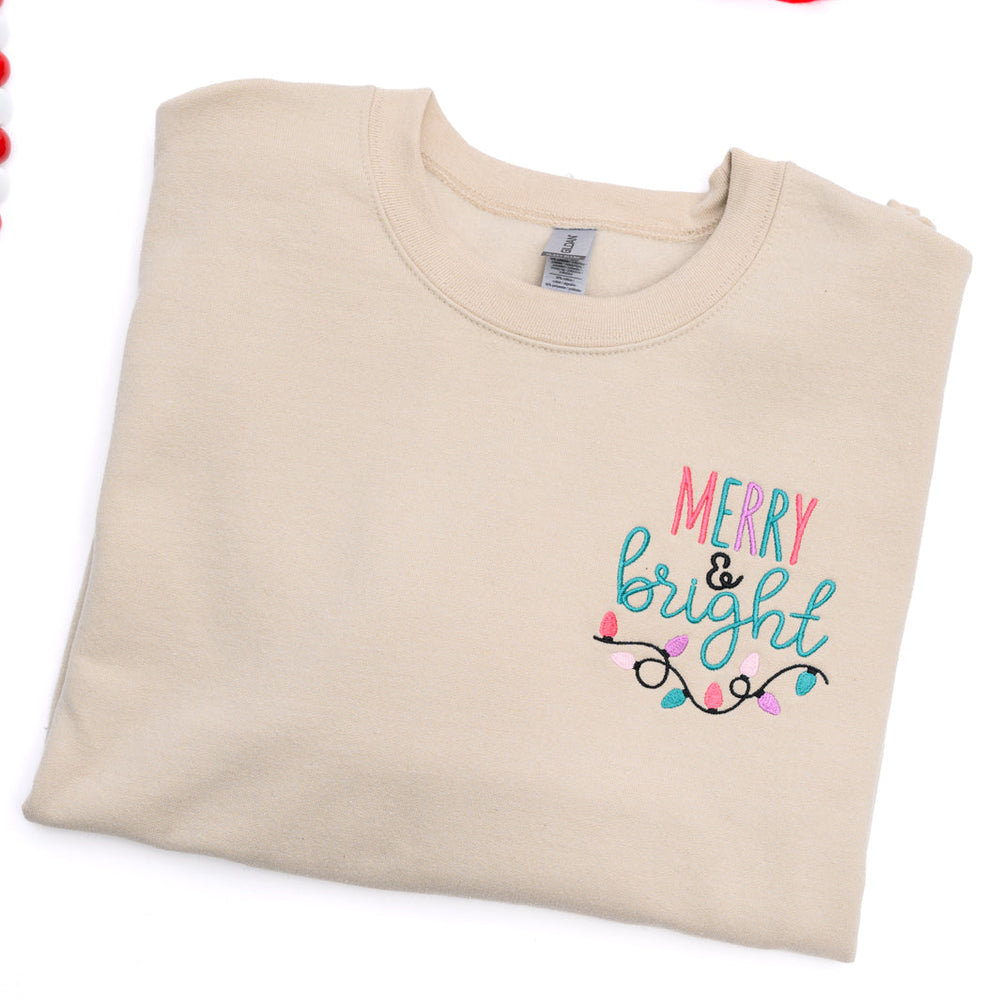 
                      
                        PREORDER: Merry & Bright Embroidered Sweatshirt in Sand
                      
                    