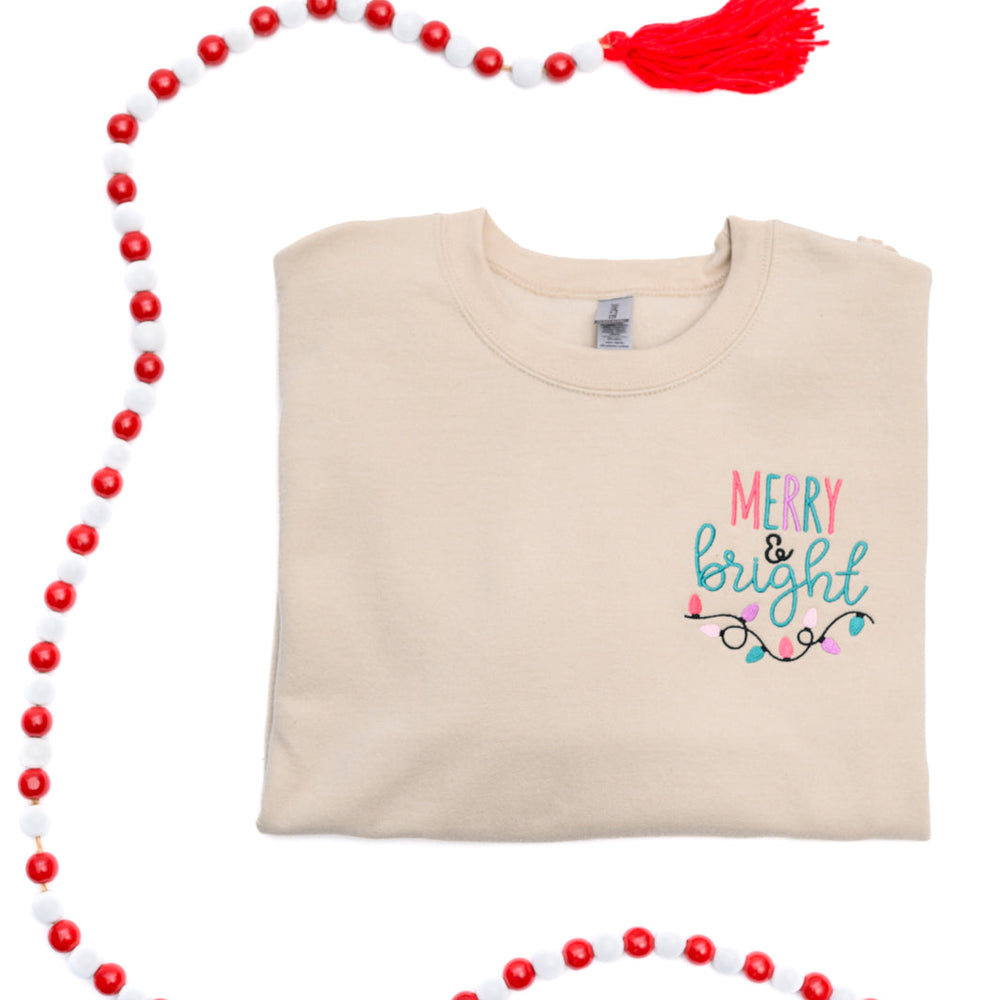 
                      
                        PREORDER: Merry & Bright Embroidered Sweatshirt in Sand
                      
                    