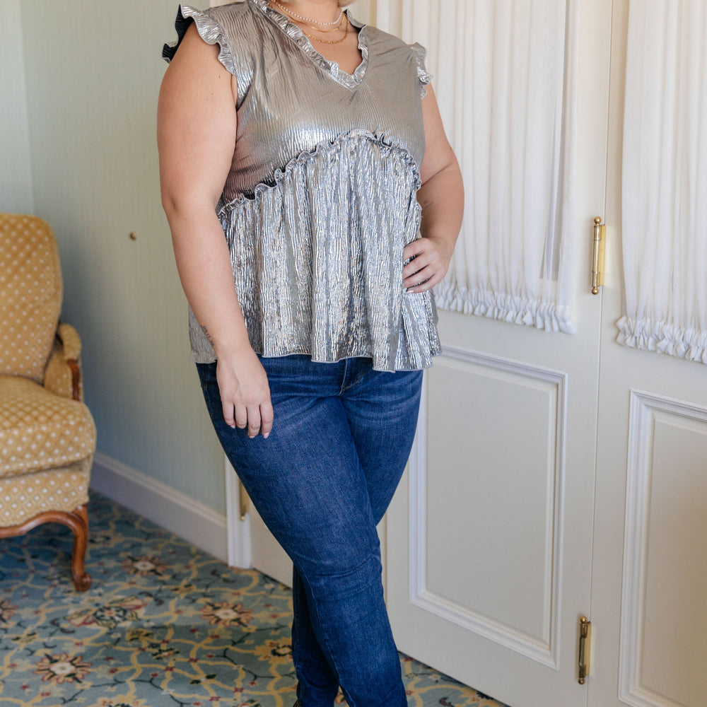 
                      
                        Shine On Metallic Peplum Top
                      
                    