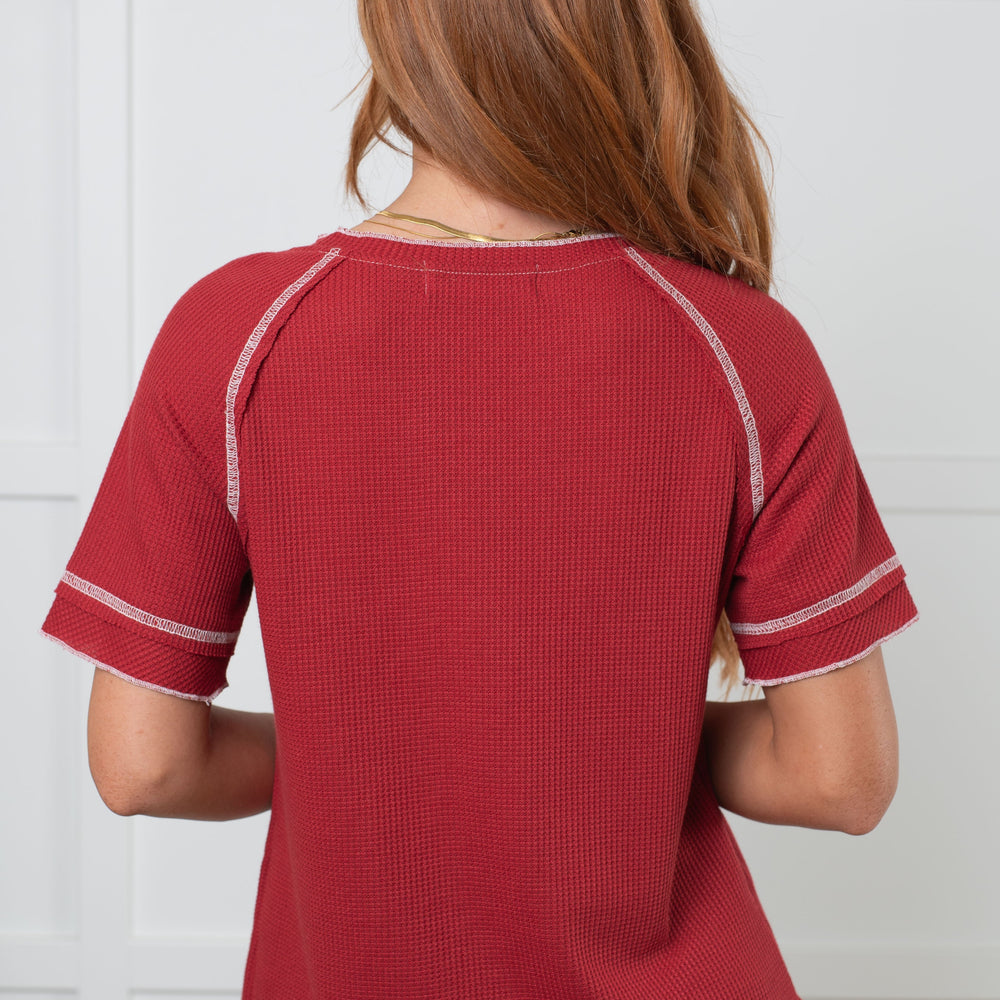 
                      
                        Heartbreaker Waffle Knit Tee in Cranberry
                      
                    