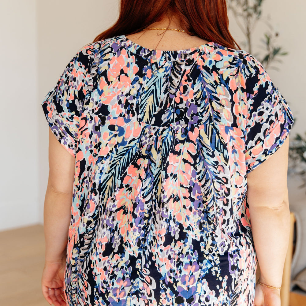 
                      
                        Lizzy Cap Sleeve Top in Navy Abstract Floral
                      
                    