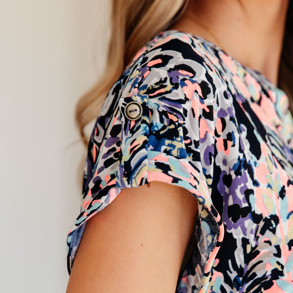 
                      
                        Lizzy Cap Sleeve Top in Navy Abstract Floral
                      
                    