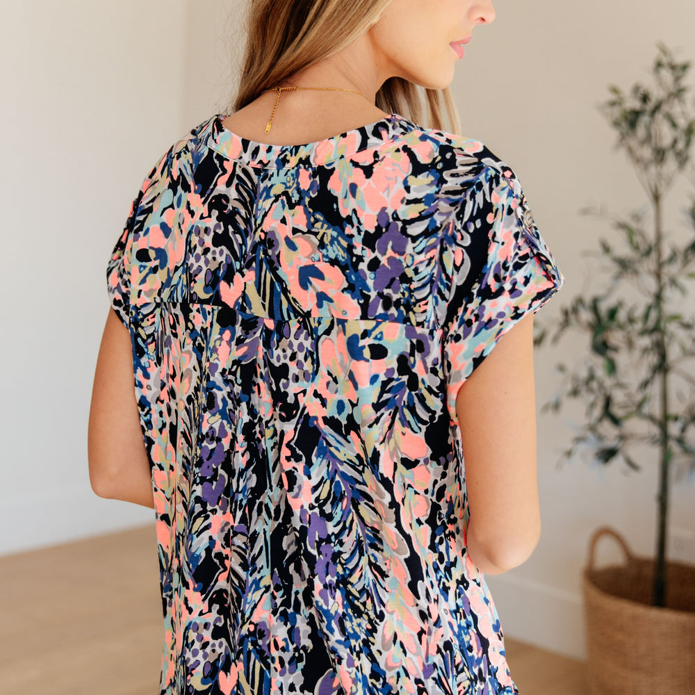 
                      
                        Lizzy Cap Sleeve Top in Navy Abstract Floral
                      
                    