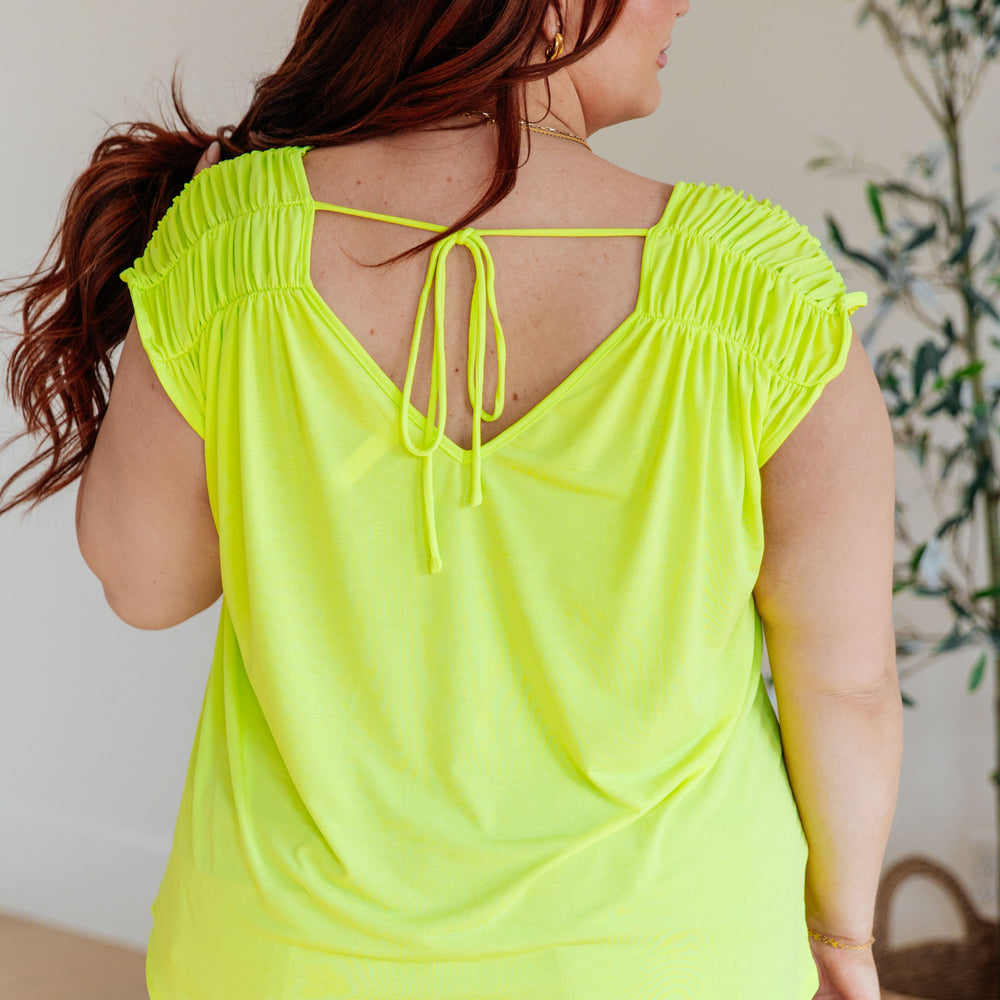 
                      
                        Ruched Cap Sleeve Top in Neon Green
                      
                    