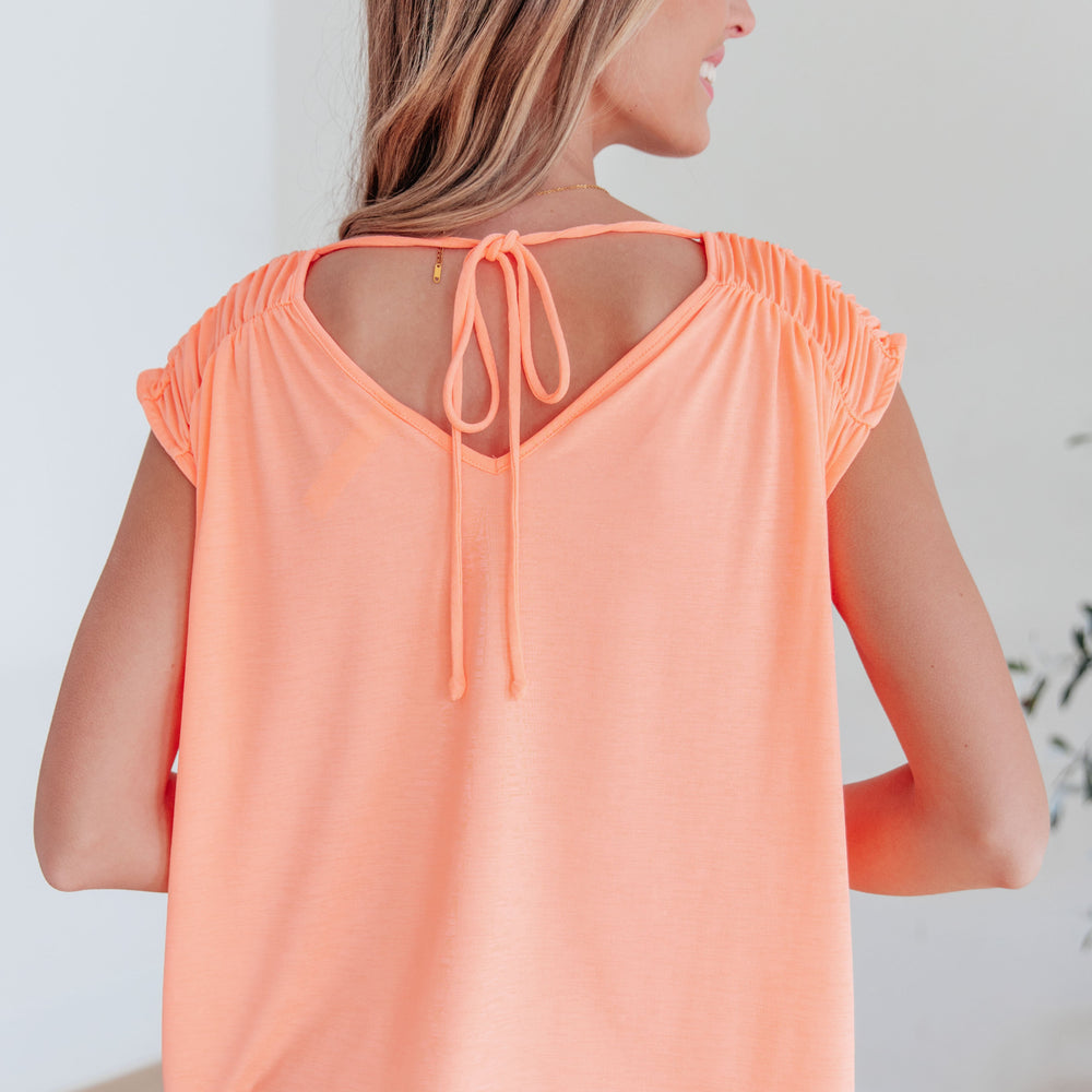 
                      
                        Ruched Cap Sleeve Top in Neon Orange
                      
                    