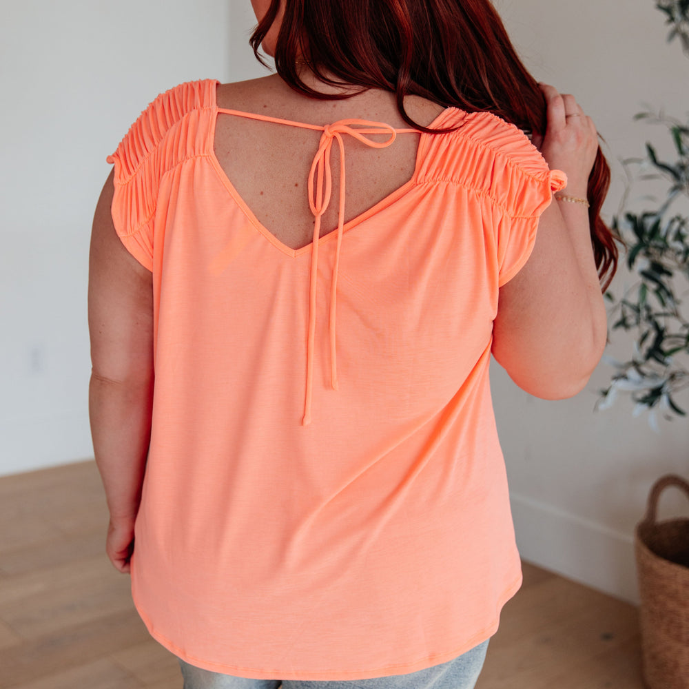 
                      
                        Ruched Cap Sleeve Top in Neon Orange
                      
                    