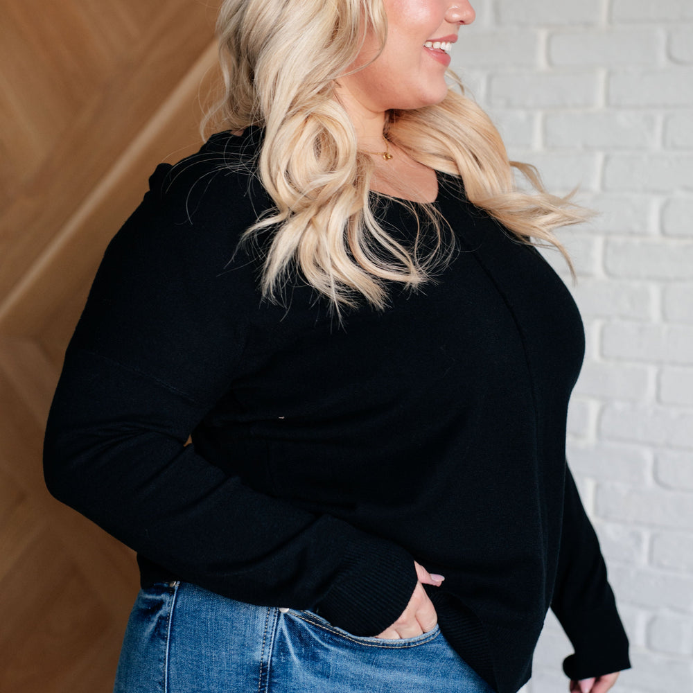 
                      
                        V-Neck Front Seam Sweater in Black
                      
                    