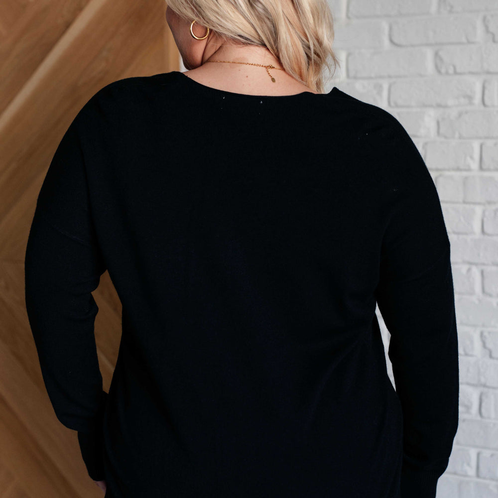 
                      
                        V-Neck Front Seam Sweater in Black
                      
                    