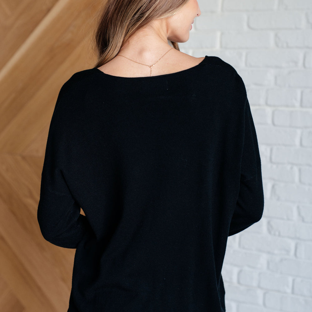 
                      
                        V-Neck Front Seam Sweater in Black
                      
                    